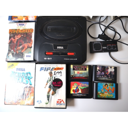 60 - Sega Mega Drive 2 (MK-1631-50)& Dreamcast (HKT-3030) Console + games & controllers