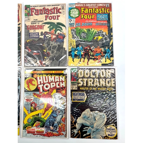 138 - A group of 1960's -70's Marvel comics including Thor, Iron Man, Fantastic Four, Human Torch, Doctor ... 