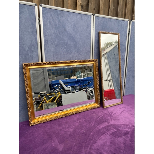 696 - Two gilt framed mirrors