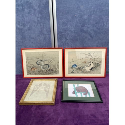 712 - Four miscellaneous framed material pieces.