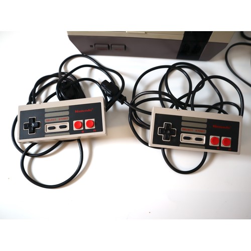 61 - Nintendo NES System NESE-001 with 2 controllers and cables