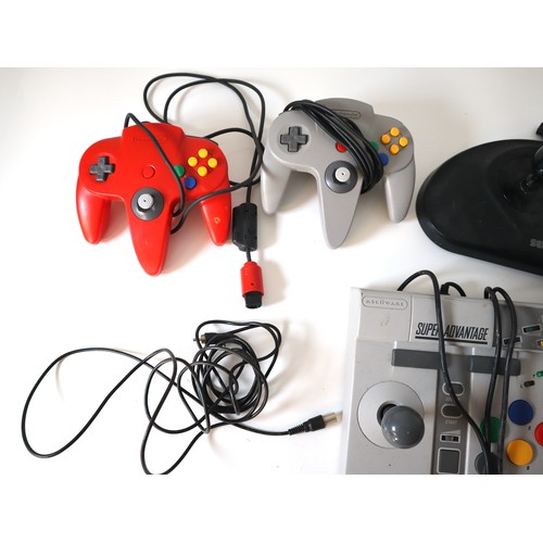 67 - Nintendo NES aftermarket control pad, Two Nintendo N64 Controllers SEGA Arcade Power Stick II + Game... 