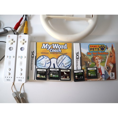 68 - A group of Nintendo accessories for Wii & Switch  Nintendo DS games