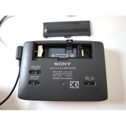 69 - Sony Walkman Cassette Player WM-EX508 with stick controller headphones + instructions