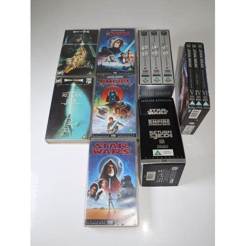 85 - A group of Star Wars VHS Tapes & DVD's