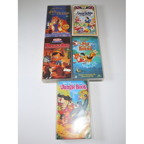 86 - A group of Disney Classic VHS Tapes including, Jungle Book, Pinocchio, Fox and the Hound, Land and t... 