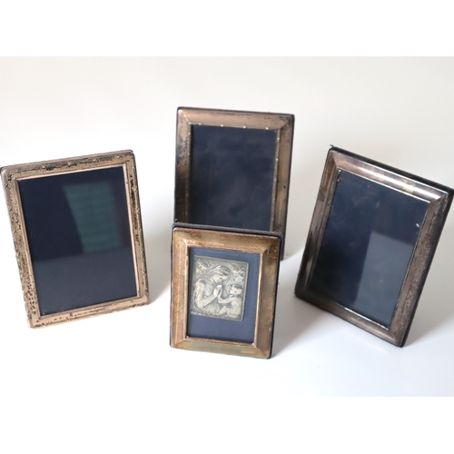 96 - Four Sterling Silver framed Carrs Photo Frames