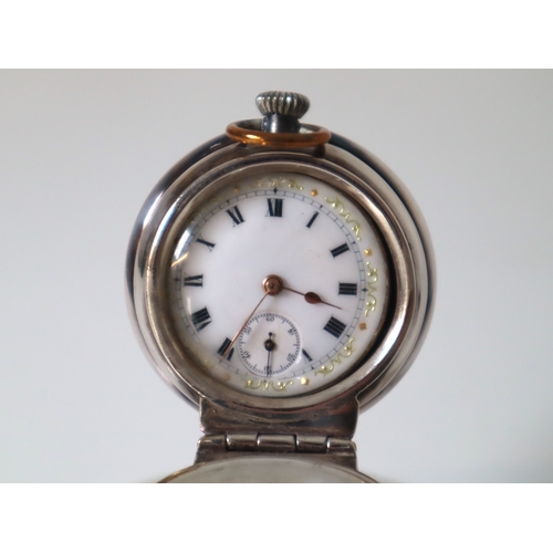 98 - Sterling Silver Inkwell revealing a white enamelled pocket clock with copper oval monogram