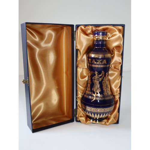 77 - A bottle of Metaxa Greek Brandy Centenary Decanter, handmade decanter with 18k Gold in presentation ... 