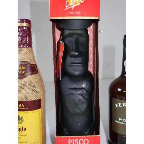 79A - Siglo 1988 Rioja, Pisco Reservado 40% vol 750ml in Easter Island Head decanter + Ferrerira Porto Bra... 