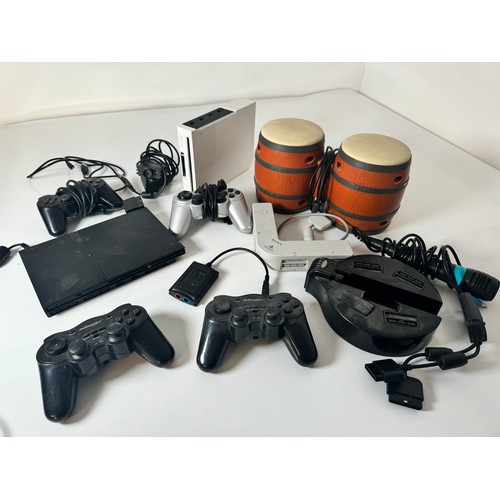 90 - Sony Playstation 2 Slim, Nintendo Wii + controllers,  multitap, Bongos, accessories and cables