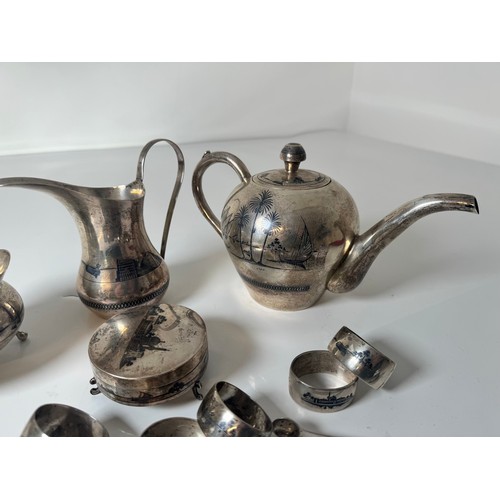 118A - Egyptian Silver Tea Service including Tea Pot , Pourer, Sugar Pot, Tongs, Napkin Rings, + Two lidded... 