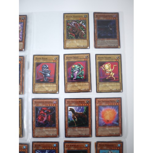 154 - A group of 8 pages of Yu-Gi-Oh Trading Cards including singles from collectors tins , starter decks ... 