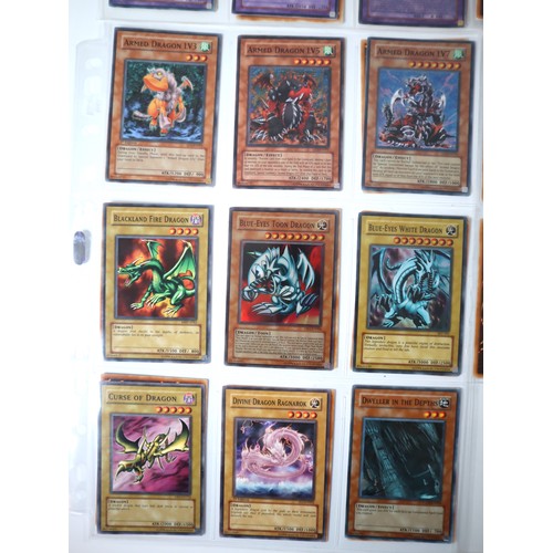 154 - A group of 8 pages of Yu-Gi-Oh Trading Cards including singles from collectors tins , starter decks ... 