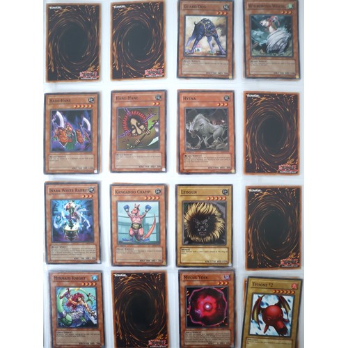 154 - A group of 8 pages of Yu-Gi-Oh Trading Cards including singles from collectors tins , starter decks ... 