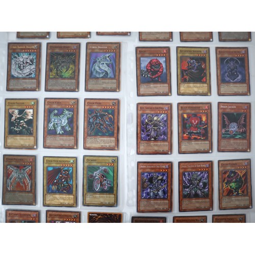 155 - A group of approximately 200 Yu-Gi-Oh Trading Cards including singles from collectors tins , starter... 