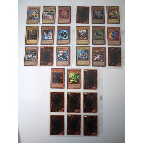 155 - A group of approximately 200 Yu-Gi-Oh Trading Cards including singles from collectors tins , starter... 