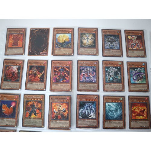 156 - A group of approximately 200 Yu-Gi-Oh Trading Cards including singles from collectors tins , starter... 