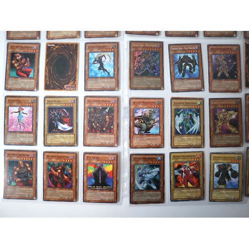 156 - A group of approximately 200 Yu-Gi-Oh Trading Cards including singles from collectors tins , starter... 