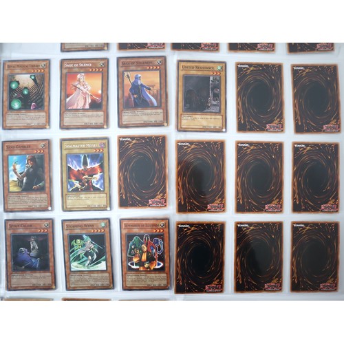 156 - A group of approximately 200 Yu-Gi-Oh Trading Cards including singles from collectors tins , starter... 