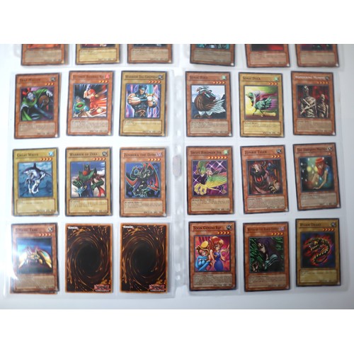 156 - A group of approximately 200 Yu-Gi-Oh Trading Cards including singles from collectors tins , starter... 