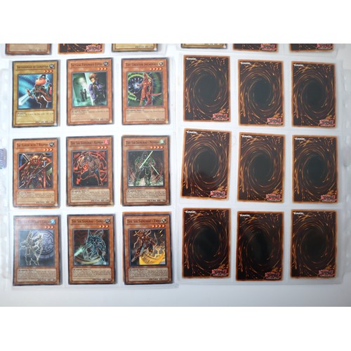 156 - A group of approximately 200 Yu-Gi-Oh Trading Cards including singles from collectors tins , starter... 