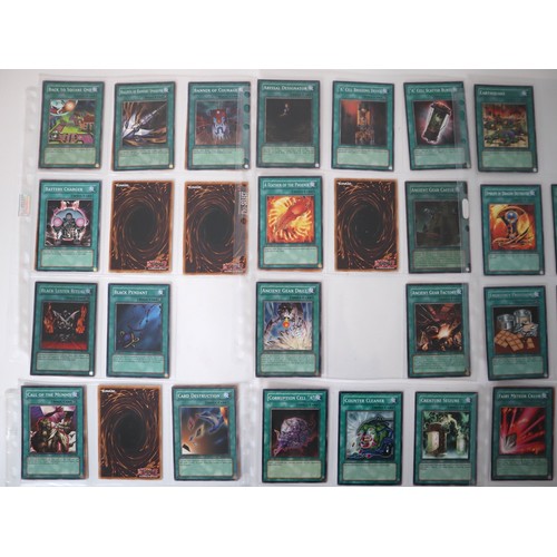 159 - A group of approximately 200 Yu-Gi-Oh Spell Trading Cards including singles from collectors tins , s... 