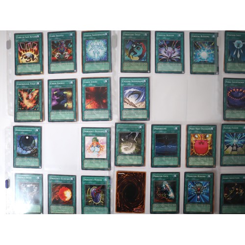 159 - A group of approximately 200 Yu-Gi-Oh Spell Trading Cards including singles from collectors tins , s... 