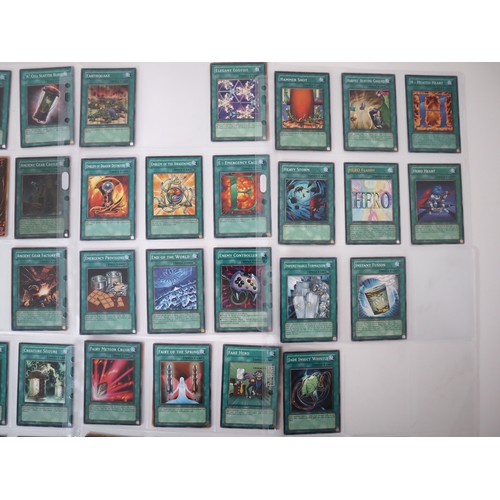 159 - A group of approximately 200 Yu-Gi-Oh Spell Trading Cards including singles from collectors tins , s... 