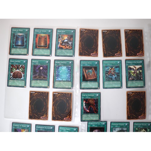 159 - A group of approximately 200 Yu-Gi-Oh Spell Trading Cards including singles from collectors tins , s... 