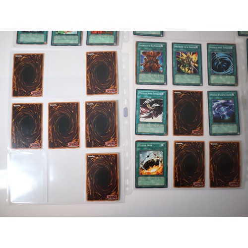 159 - A group of approximately 200 Yu-Gi-Oh Spell Trading Cards including singles from collectors tins , s... 