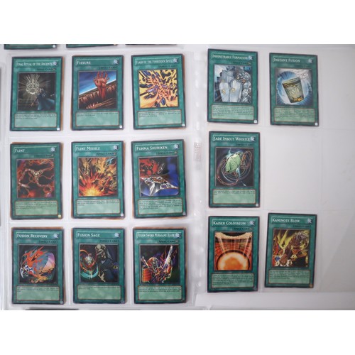 159 - A group of approximately 200 Yu-Gi-Oh Spell Trading Cards including singles from collectors tins , s... 