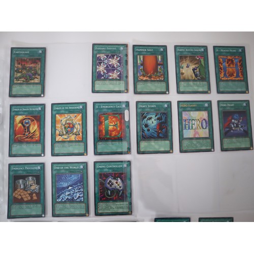 159 - A group of approximately 200 Yu-Gi-Oh Spell Trading Cards including singles from collectors tins , s... 