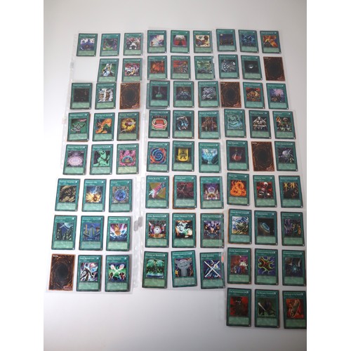 159 - A group of approximately 200 Yu-Gi-Oh Spell Trading Cards including singles from collectors tins , s... 