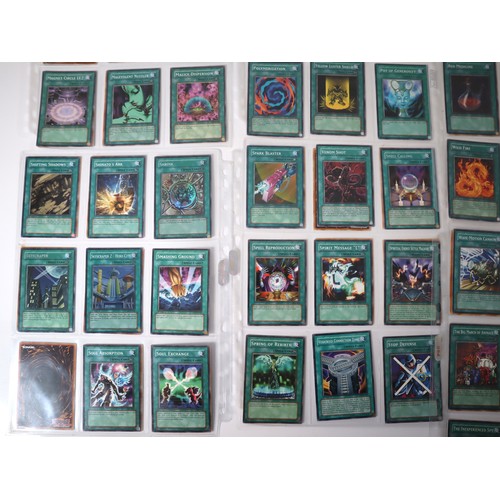 159 - A group of approximately 200 Yu-Gi-Oh Spell Trading Cards including singles from collectors tins , s... 