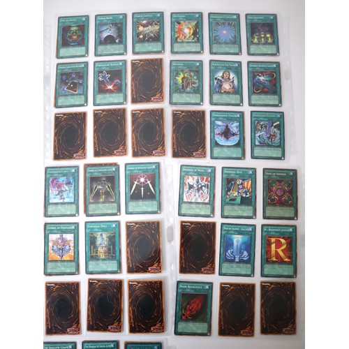 159 - A group of approximately 200 Yu-Gi-Oh Spell Trading Cards including singles from collectors tins , s... 