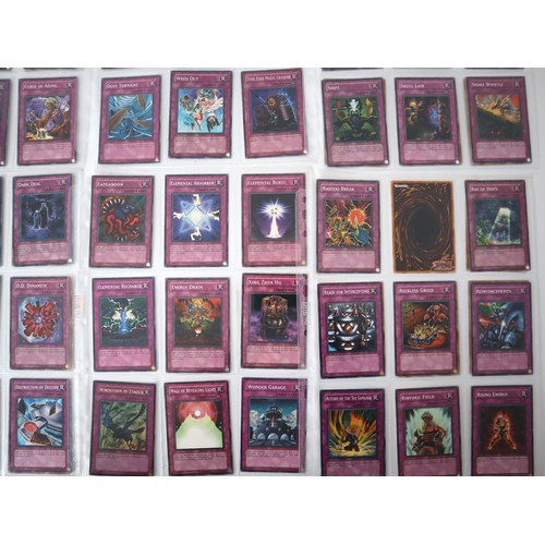 160 - A group of approximately 200 Yu-Gi-Oh Trap Trading Cards including singles from collectors tins , st... 