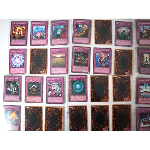 160 - A group of approximately 200 Yu-Gi-Oh Trap Trading Cards including singles from collectors tins , st... 