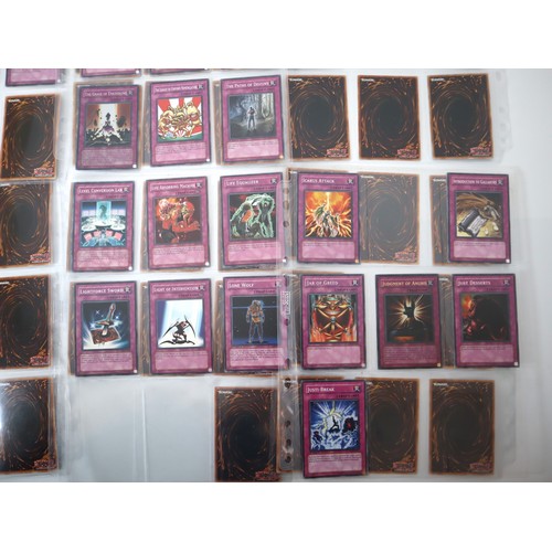 160 - A group of approximately 200 Yu-Gi-Oh Trap Trading Cards including singles from collectors tins , st... 