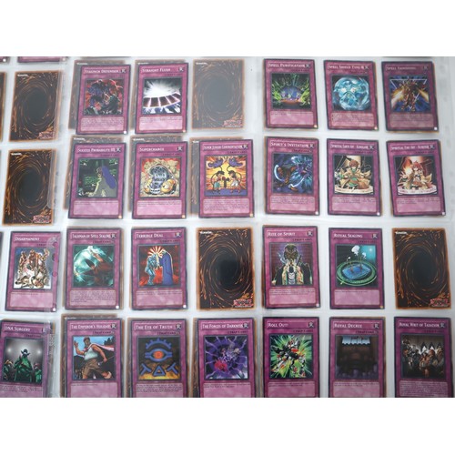 160 - A group of approximately 200 Yu-Gi-Oh Trap Trading Cards including singles from collectors tins , st... 