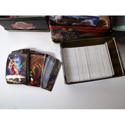 157 - A group of Yu-Gi-Oh Trading cards from 2005-2010 with collectbale tins, constructed decks with liter... 