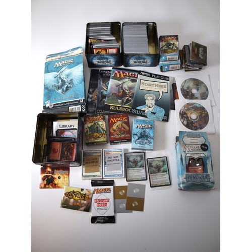 158 - Magic the Gathering TCG - A group of cards, decks, guides CD ROM's from 2006-2009