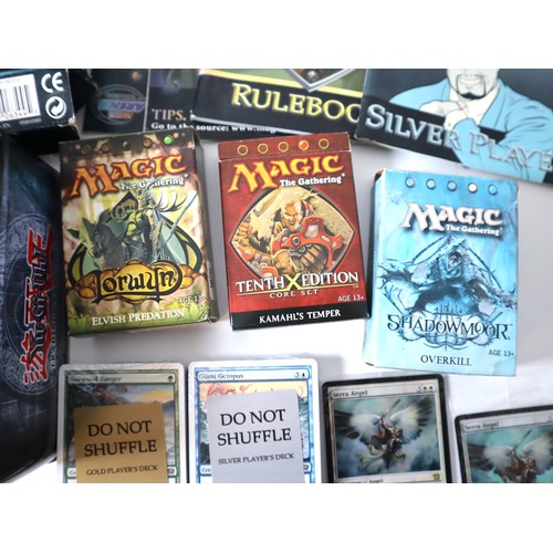 158 - Magic the Gathering TCG - A group of cards, decks, guides CD ROM's from 2006-2009