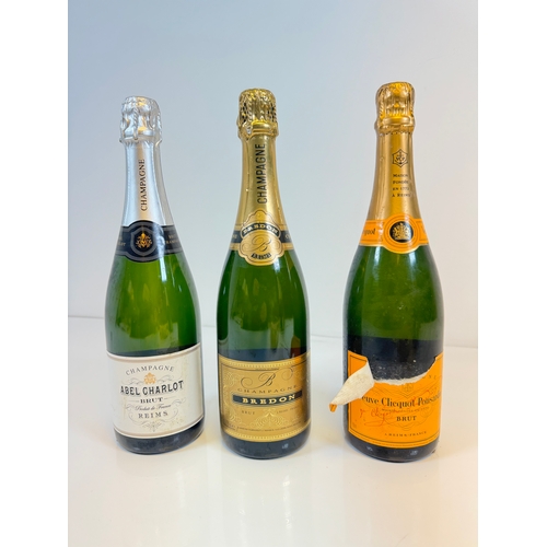 163 - Three bottles of Champagne Abel Charlot Brut, Bredon Brut, Veuve Clicquot Ponsardin