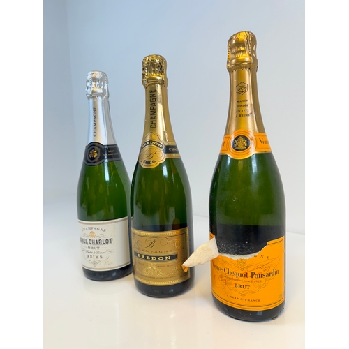 163 - Three bottles of Champagne Abel Charlot Brut, Bredon Brut, Veuve Clicquot Ponsardin