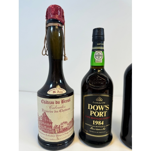 168 - Four bottles - Chateau du Breuil Calvados Reserve du Chateau 8 Years, DOW'S Port Late bottled Vintag... 