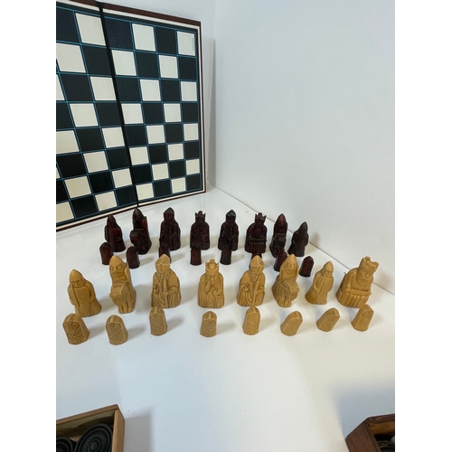 303 - A collection of Chess and Draughts pieces