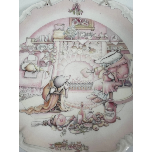 331 - A collection of Royal Doulton Wind and the Willows plates with Winnie the Pooh bowl.