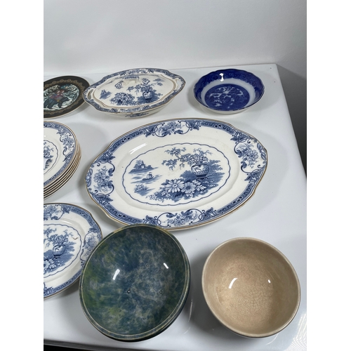 332 - A large lot of miscellaneous collectable ceramics including decorative plates and dishes.