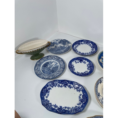 332 - A large lot of miscellaneous collectable ceramics including decorative plates and dishes.